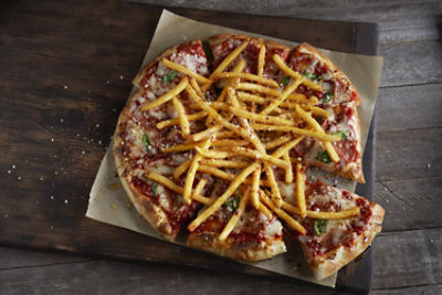  36001 PIZZA TOPPED WITH GII SUPER CRISPY SHOESTRING FRIES ON PARCHMENT AND WOOD PLANK                            