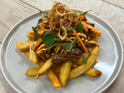 Seashore Fries topped with Spiced Braised Beef and Escabeche