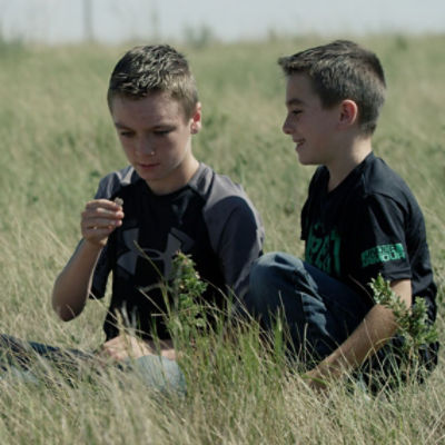 Children Playing in Field